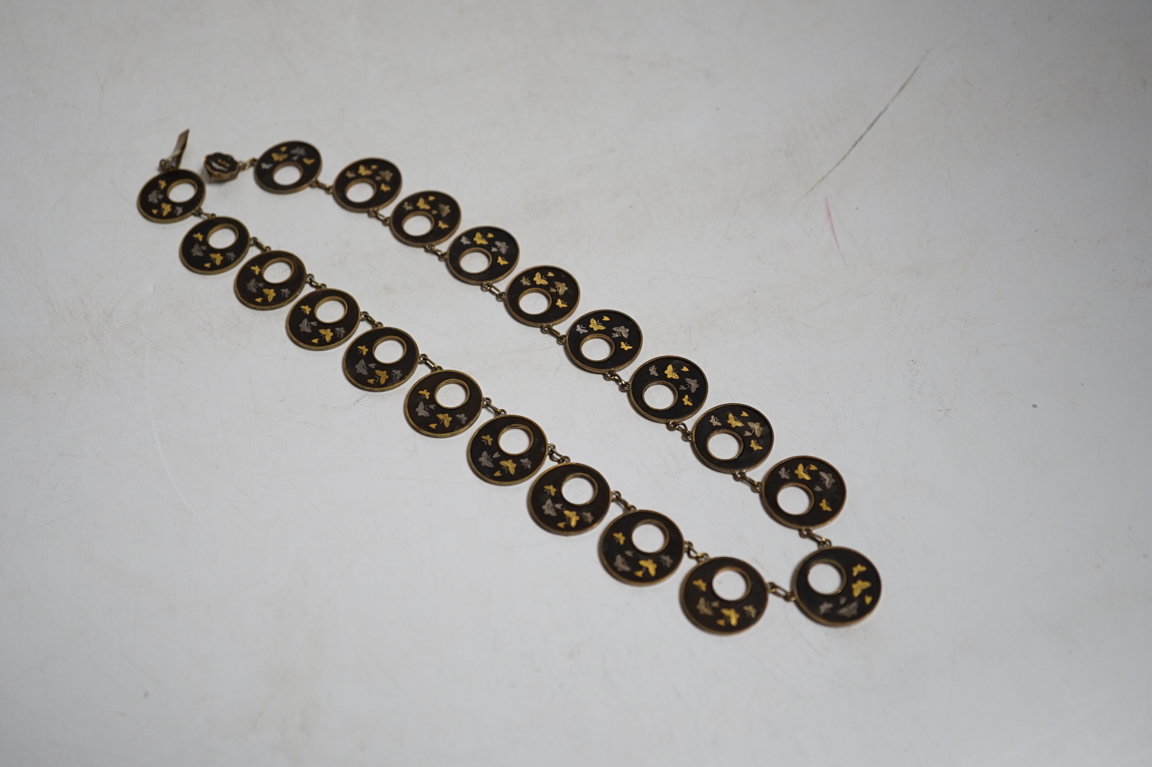 A Japanese mixed metal necklace, early 20th century, stamped K24